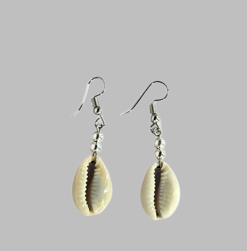 Earring With Sliced Cowrie And Two Silver Beads.