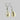 Earring With Sliced Cowrie Steel Bead