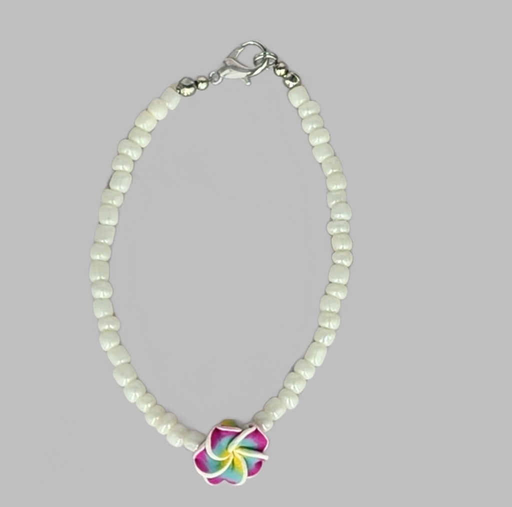 White Bead With Flower Assorted Color Bracelet. Bracelet